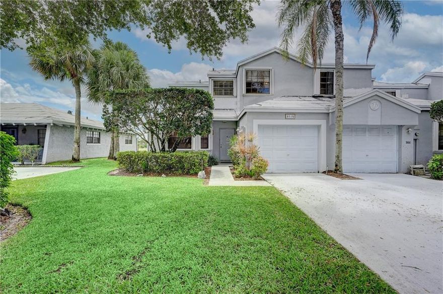 Welcome to your new home!! This spacious, bright 2 bedroom 2.5 bathroom with a HUGE loft, and vaulted ceilings home is located in the Heart of Tamarac. This corner unit townhouse features a eat-in kitchen, one bedroom on the first floor, one car garage, hurricane accordion shutters and 2022 ROOF!!!! Relax after a long day in your screened patio over looking the gorgeous water view and golf course with beautiful sunsets.  Property is close to all major highways, restaurants and shops.  Come see it today!!!