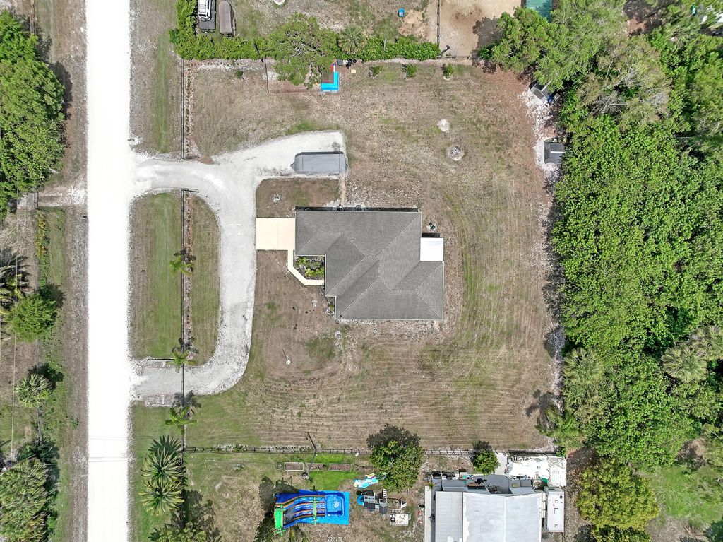 Photo of 18936 Orange Grove Boulevard, Loxahatchee, FL 33470 (MLS # R10987042)