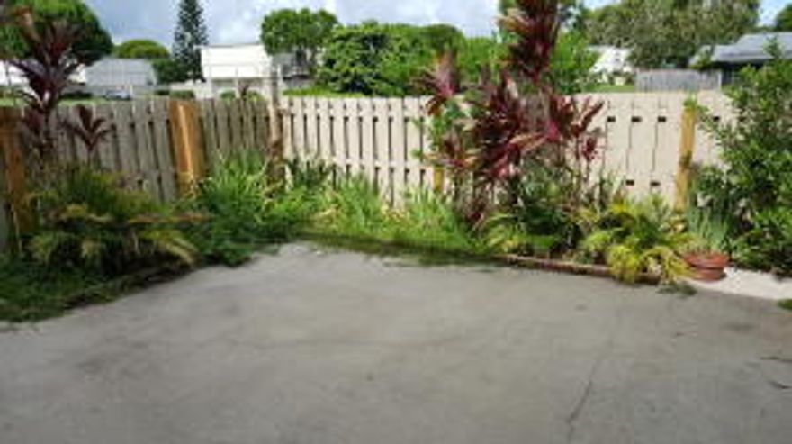 Beautifully updated and large 3 bedroom, 2.5 bath townhouse with upgrades galore. Upgraded tiled kitchen and bathroom countertops, cabinets, appliances, light fixtures and fans. Large fenced and private courtyard, balcony off master bedroom, lake views from all 3 bedrooms. Large extra storage under stairway. Vacant and ready to move in. 2 small pets or one larger pet will be considered on a case by case basis with a $300 non-refundable pet fee.