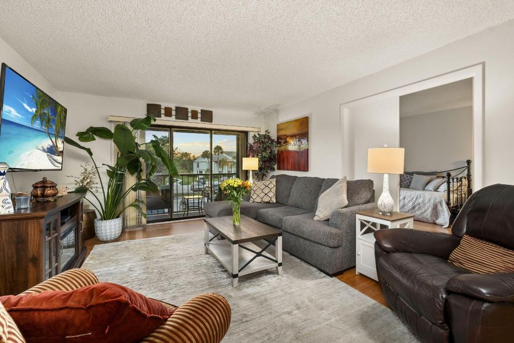 Photo of 1575 SW Silver Pine Way #108-A2, Palm City, FL 34990 (MLS # R11158046)