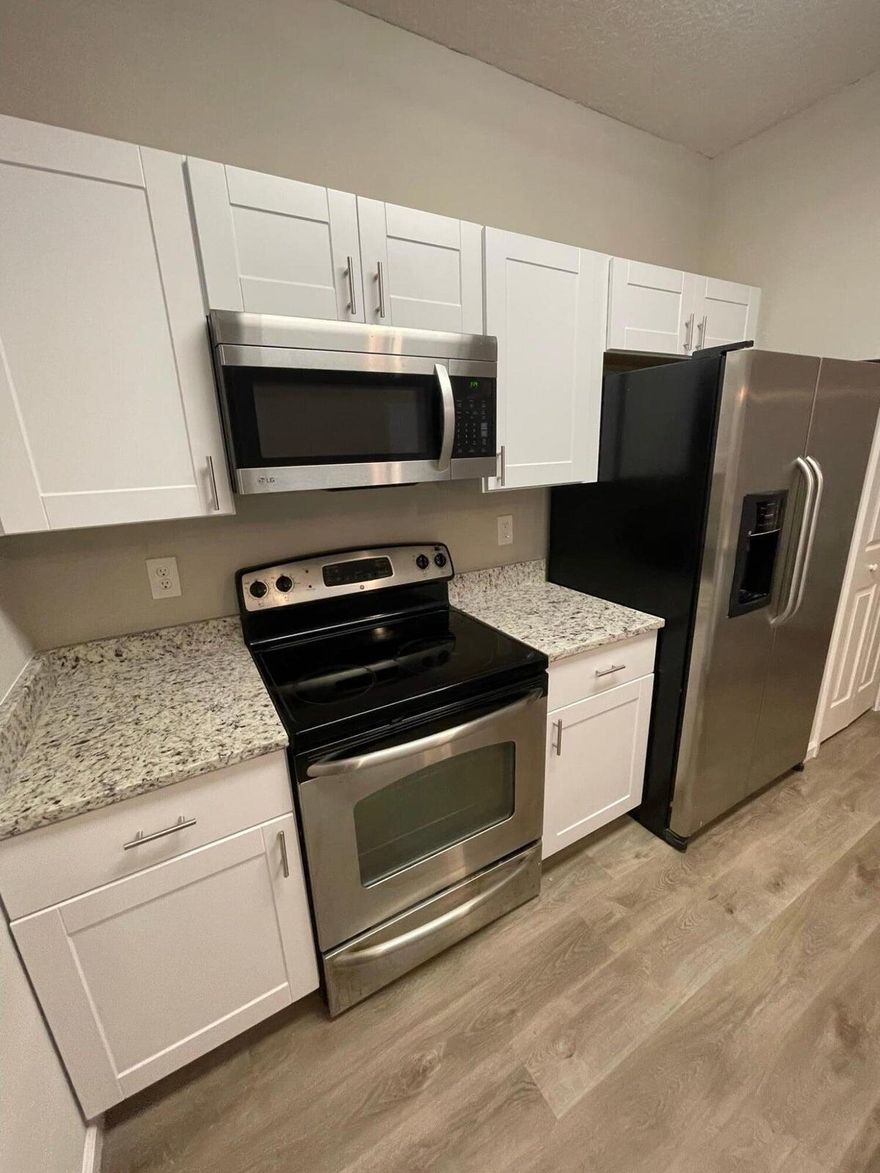 Stunning ground-floor condo in the highly desirable gated community of Summer Key! Investor Welcome (tenant in place). This turnkey 2-bedroom, 2-bathroom unit offers complete peace of mind with a brand-new A/C system installed in 2025 and a full renovation completed in 2023. The interior features a modern open concept floor plan with updated flooring, 42" kitchen cabinets, granite countertops, and stainless steel appliances. The split bedroom layout provides maximum privacy, perfect for roommates or a home office. Enjoy the Florida lifestyle with resort-style amenities, including a sparkling pool, fitness center, indoor basketball court, and clubhouse. Ideally located just minutes from St. Johns Town Center, FSCJ, and major highways.