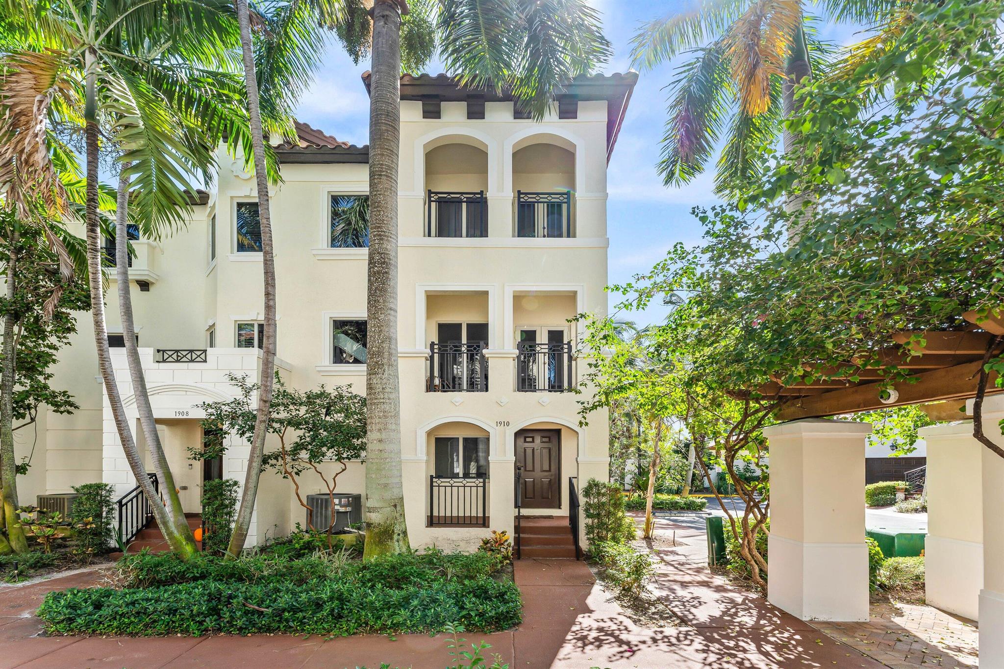 Beautifully remodeled corner-unit townhome in gated Coastal Bay, just minutes from the beach, I-95, and Downtown Delray! This modern Mediterranean-style home offers 2 bedrooms, 3.5 baths, and a versatile bonus room perfect for a home office, gym, or guest space. The stylish kitchen features stainless steel appliances, light wood cabinetry, quartz countertops, open shelving, and a custom range hood with copper accents. Bathrooms provide a spa-like retreat with a freestanding soaking tub, glass-enclosed shower with gold hardware, and a dual vanity with a patterned accent wall. Enjoy open-concept living, three balconies, and a spacious two-car garage. Brand new roof and recently refreshed community exterior. Rent includes cable, internet, Orkin pest control, and ADT security.