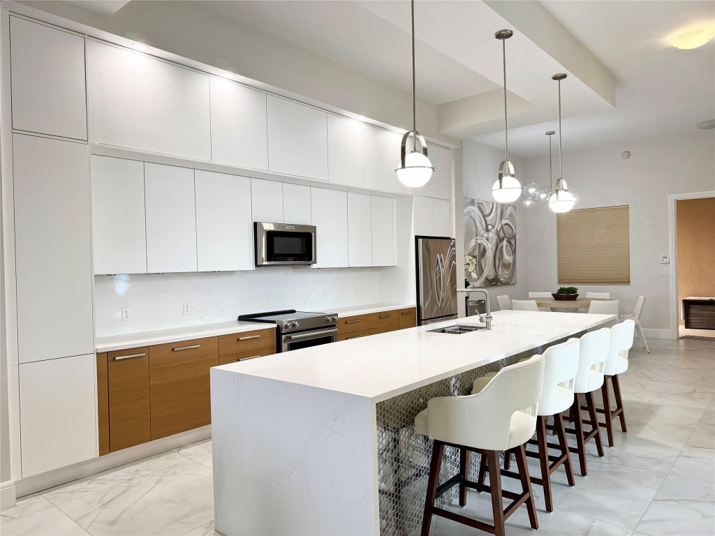 Photo of 4445 El Mar Drive #401, Lauderdale By The Sea, FL 33308 (MLS # F10477418)
