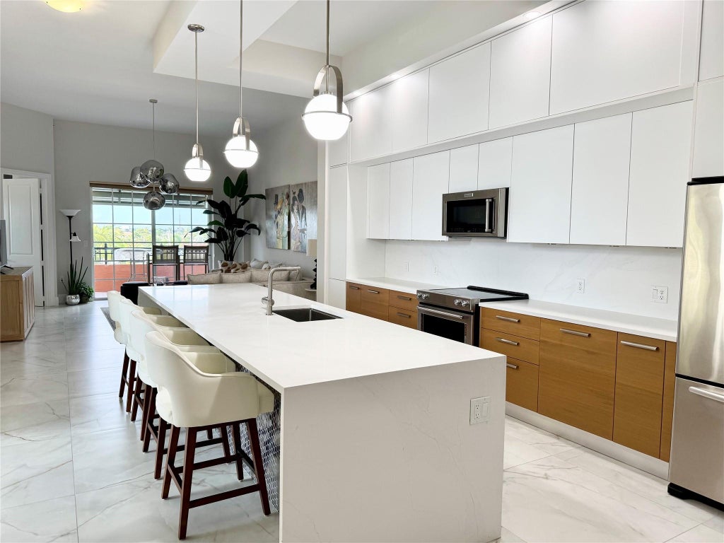 Photo of 4445 El Mar Drive #401, Lauderdale By The Sea, FL 33308 (MLS # F10477418)