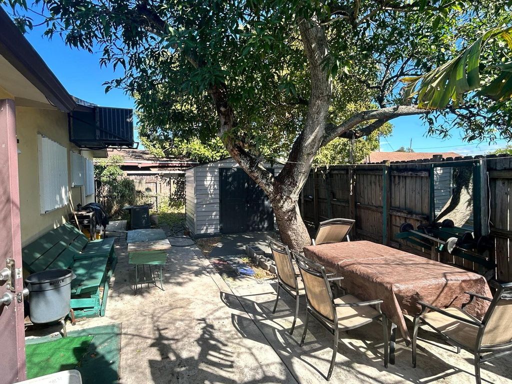 Photo of 142 NW 8th Avenue, Dania Beach, FL 33004 (MLS # R11162843)