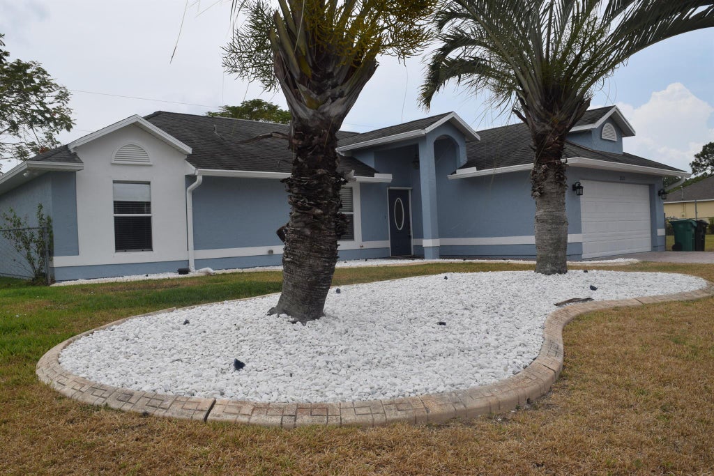 Photo of 2125 SW Gailwood Street, Port Saint Lucie, FL 34987 (MLS # R10988783)