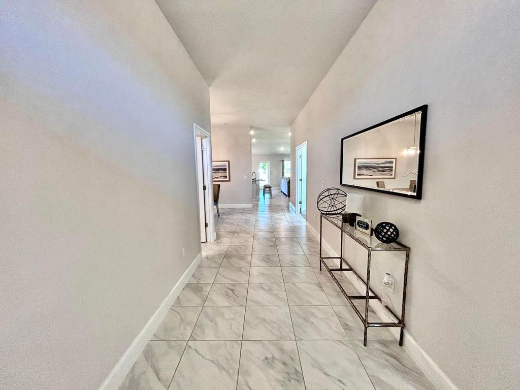 Photo of 8802 Waterstone Boulevard, Fort Pierce, FL 34951 (MLS # B26007440)