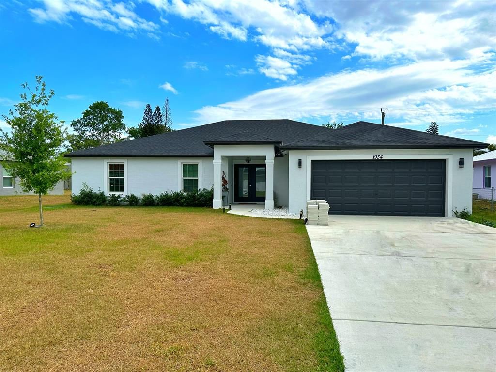 Photo of 1934 SW Del Rio Boulevard, Port St Lucie, FL 34953 (MLS # R10879152)