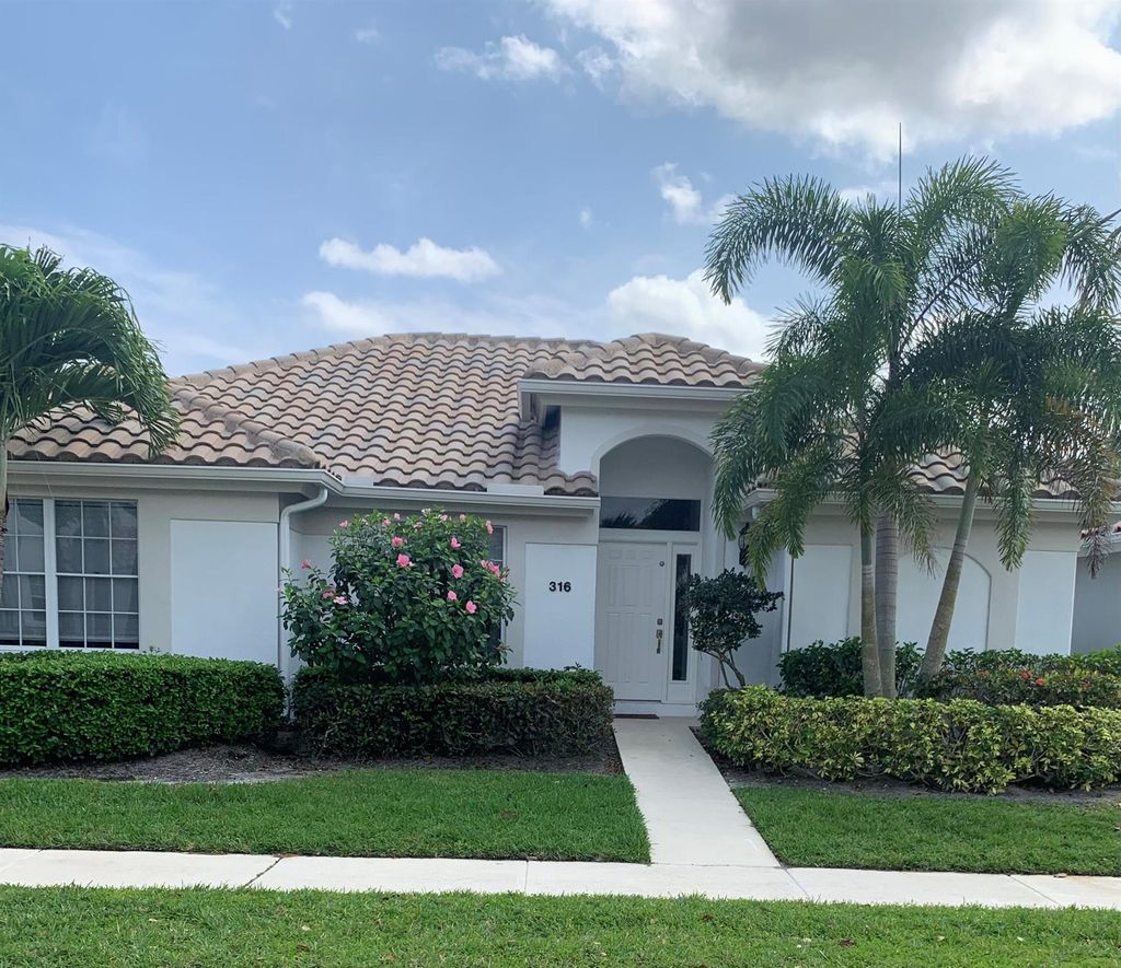 Photo of 316 Eagleton Golf Drive, Palm Beach Gardens, FL 33418 (MLS # R11065570)