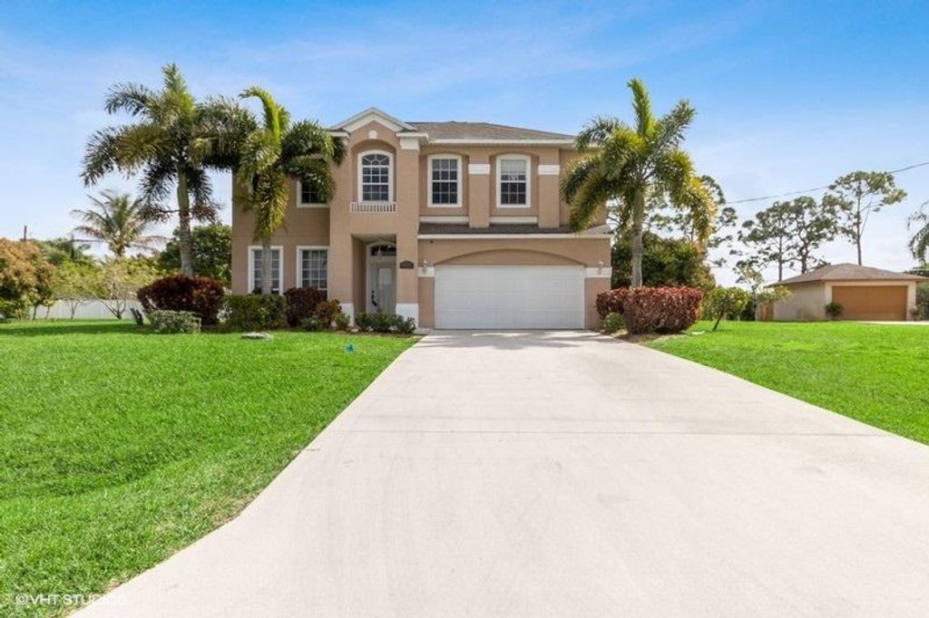 Photo of 2115 SE Elmhurst Road, Port Saint Lucie, FL 34952 (MLS # R10691075)