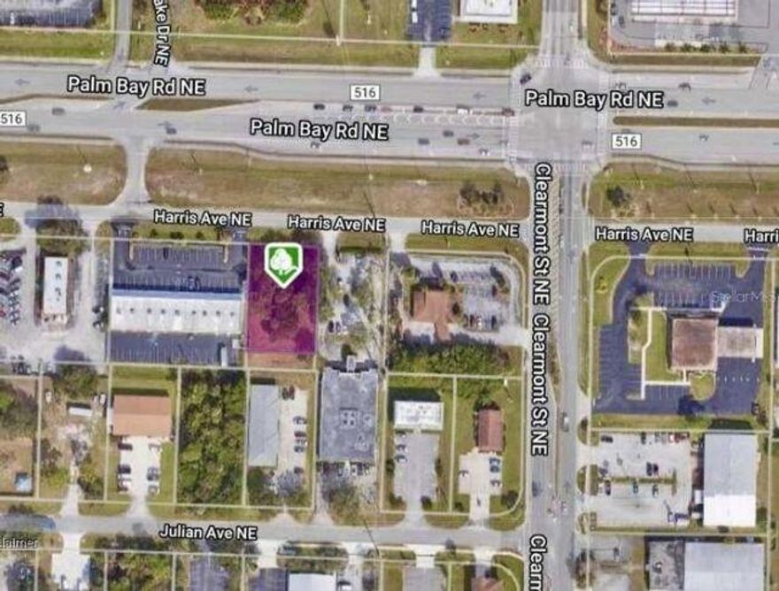 Rare opportunity to own last vacant commercial lot available in area with multiple established businesses located in retail and industrial area that sits fronting Palm Bay Rd .