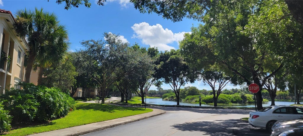 Photo of 2496 Centergate Drive #203, Miramar, FL 33025 (MLS # B26067537)