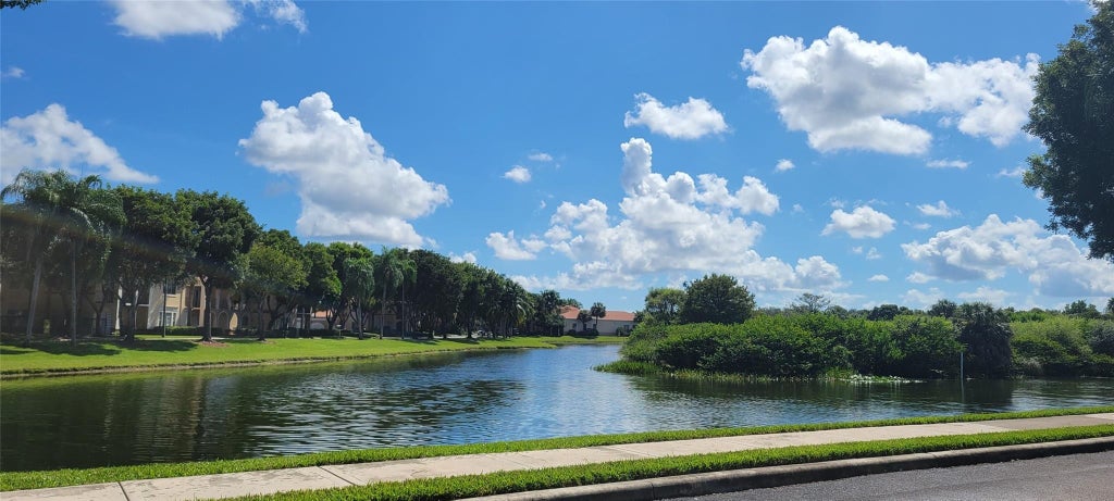 Photo of 2496 Centergate Drive #203, Miramar, FL 33025 (MLS # B26067537)