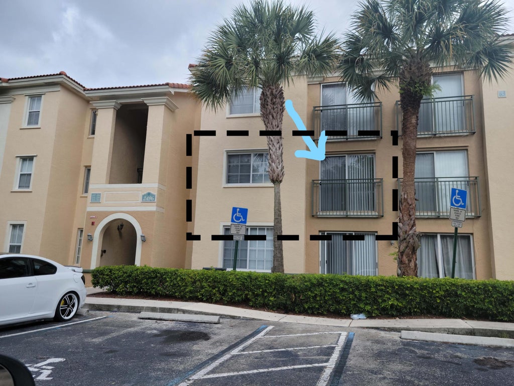 Photo of 2496 Centergate Drive #203, Miramar, FL 33025 (MLS # B26067537)