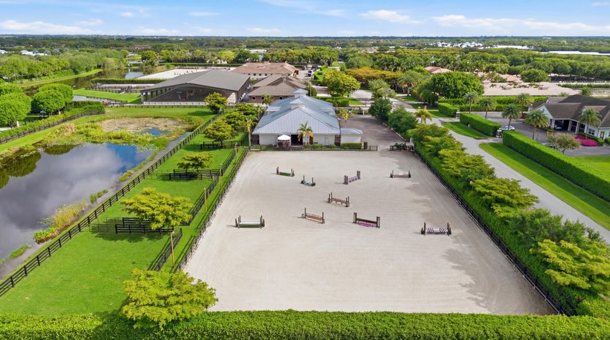 Welcome to a fantastic equestrian opportunity in Grand Prix Village South-a prime location offering the epitome of convenience for the equestrian enthusiast!  This exclusive property boasts direct bridle trail access to the WEF show grounds-a true privilege for those seeking unparalleled access to equestrian events.  At the core of the property is a 225'x140' fully irrigated, lighted arena with a new GGT footing mix.  Have the ultimate privilege of practicing  in your own private arena and then walking straight to the show ring!  Barn features include; aisle-ways with EquiTan poured rubber flooring by IDA, 24 permanent stalls, 12 grooming/flex stalls- customizable up to 36 stalls, 8 hot/cold wash stalls, 4 feed rooms, 4 tack rooms, 2 laundry rooms(8 washers/dryers), and 2 full bathrooms. Beyond the arena and stabling facilities, the property offers six well-maintained paddocks, providing ample turnout space for your equine companions. Practical considerations are not overlooked, with sufficient parking space for multiple large horse trailers, ensuring seamless logistics for transport.

The barn structure itself is engineered with the future in mind, allowing for easy expansion to a second level if desired. A fire suppression system is already in place, meeting the necessary safety standards for potential living quarter expansion. This property has a proven track record of generating exceptional seasonal rental income, making it not only a dream location for personal use but also a savvy investment opportunity.

With the recent approval for the Showgrounds expansion from the Village of Wellington, "Parcel F" will be a short, direct hack on the bridle path to the new and improved show facilities. Several permanent barns, FEI barns, vendor areas, parking, restaurant, schooling rings, covered arena, competition rings, Derby Field, and International Stadium are in the plans ( see photos/documents).