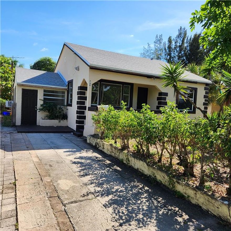 This house now has a brand new roof, was treated for termites, the electric panels have been updated and a new refrigerator and stove are under order. The house will pass all inspections. Located in a desirable area of Lake Worth, has renewed kitchen cabinets, an eat-in kitchen and a converted Florida room that could be a dining room or office plus a large backyard with fruit trees. Easy to show.