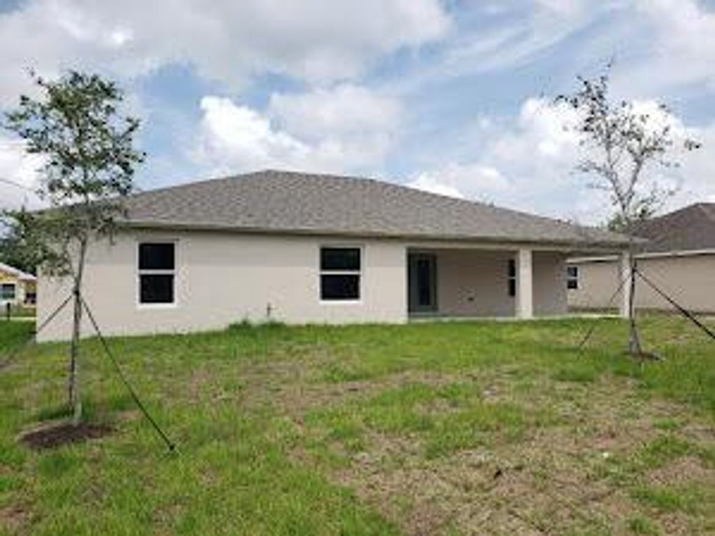 Photo of 4211 SW Jive Street, Port Saint Lucie, FL 34953 (MLS # R11082589)