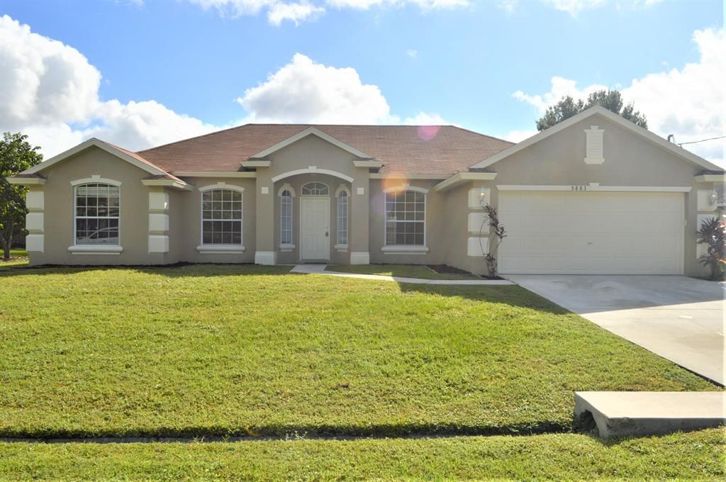 Photo of 5883 NW Files Court, Port Saint Lucie, FL 34986 (MLS # R10754765)