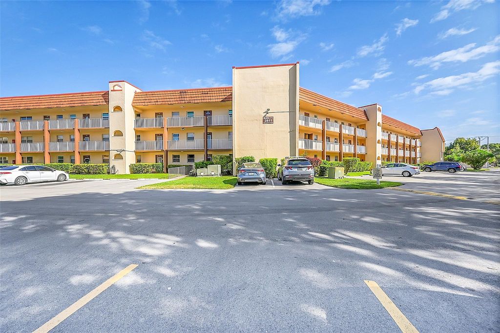 Photo of 2811 N Pine Island Rd #111, Sunrise, FL 33322 (MLS # F10541459)
