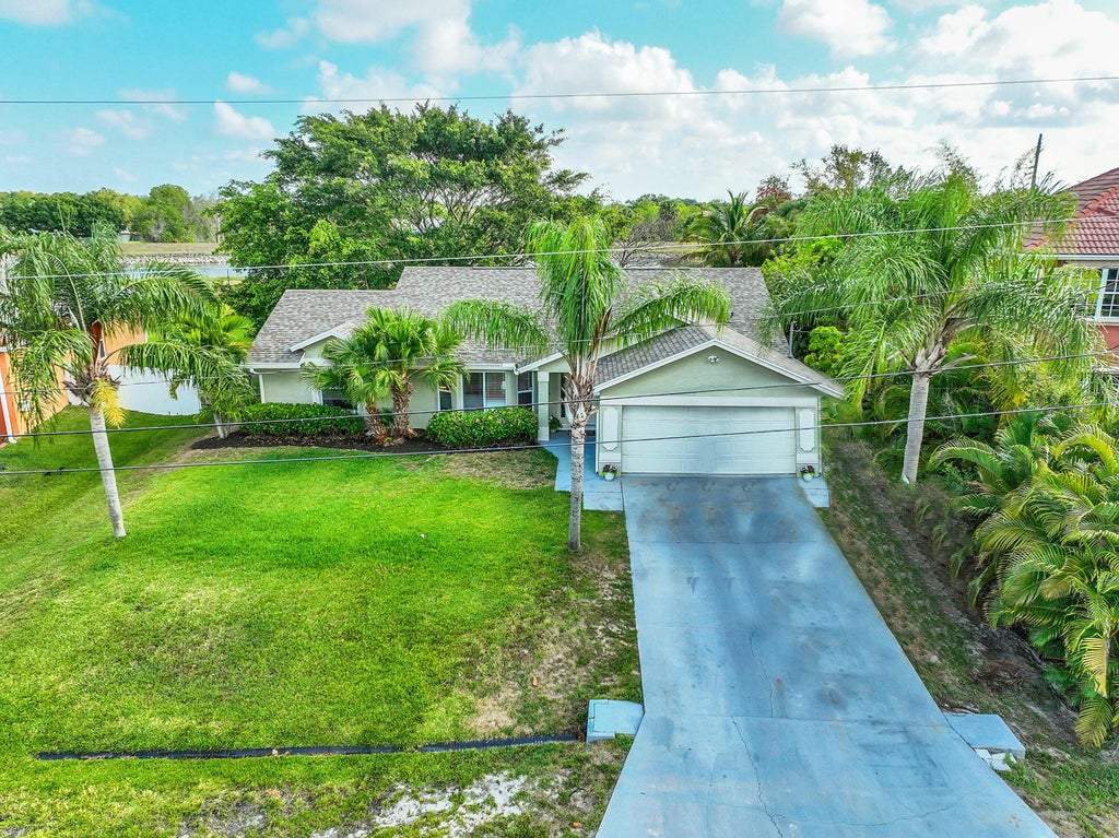 Photo of 390 SW Dalton Circle, Port Saint Lucie, FL 34953 (MLS # R10980686)