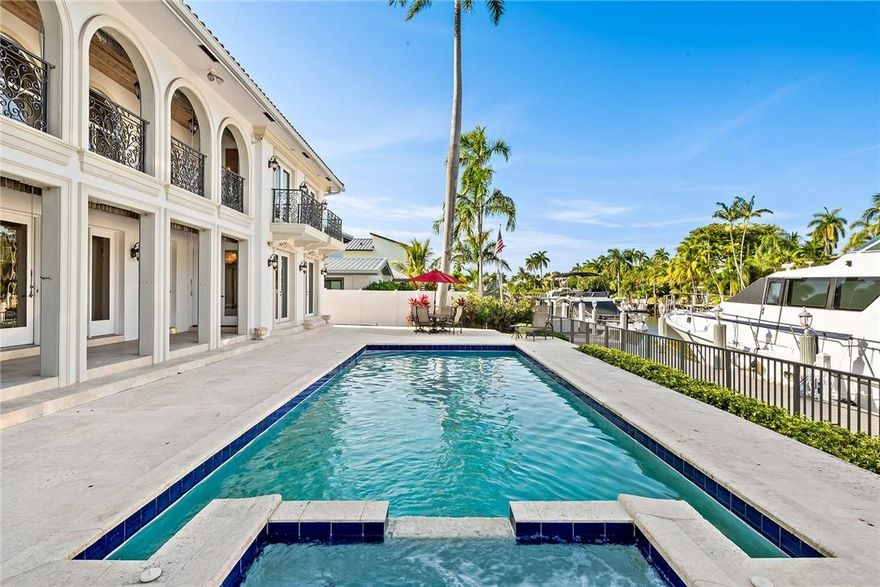 85’ Waterfront Gated Estate off Las Olas Blvd. SoFlo sunshine fills this stately, 5000sf+ contemporary Mediterranean inspired home w/gorgeous natural light. Impressive soaring ceilings, French Doors & polished marble floors flow through grand entertaining areas. Chef’s kitchen w/gas & top tier appliances opens to family fun room. VIP guest suite & music room/office suite, laundry & full cabana bath complete main level. Superb 2nd level primary suite has hardwood floors, spa style bath & walk-in custom closets! Two large secondary bedroom suites w/walk-in closets, a dedicated movie room along with Pecky cypress covered veranda which invites languid lounging overlooking the classic styled pool/spa and private backyard. Deep, circular drive, 2 car garage, impact windows/doors!