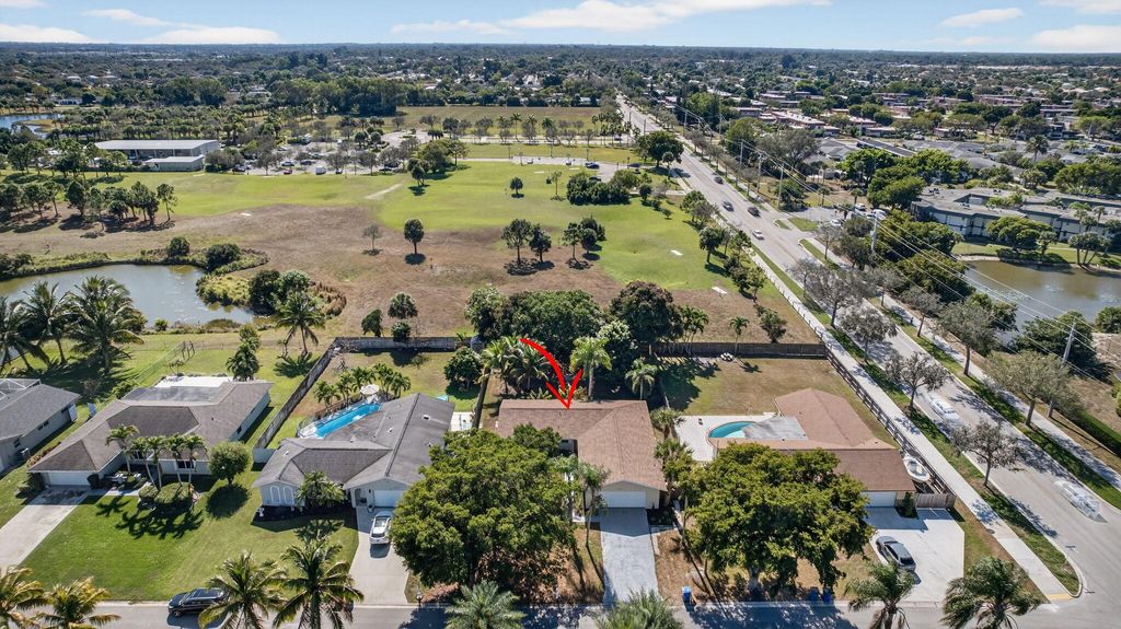 Photo of 102 Meadowlark Drive, Royal Palm Beach, FL 33411 (MLS # R11161554)