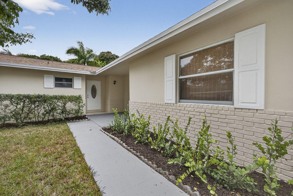 Photo of 102 Meadowlark Drive, Royal Palm Beach, FL 33411 (MLS # R11161554)
