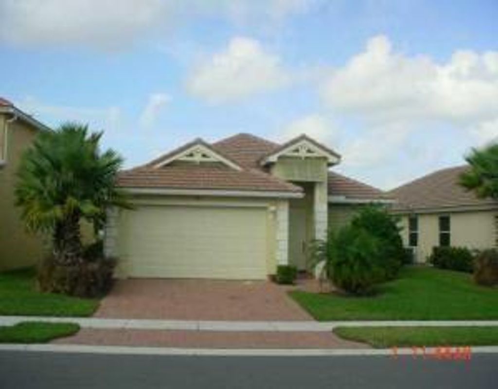 Photo of 156 Mulberry Grove Road, Royal Palm Beach, FL 33411 (MLS # R11077044)