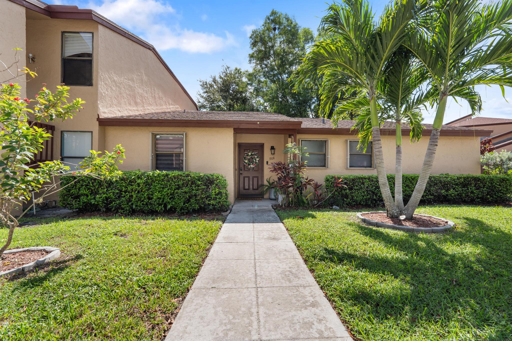 Welcome to this stunning fully remodeled 2-bedroom, 2-bathroom condo located in the desirable community of Trails at Royal Palm Beach. Step inside and be greeted by a bright open-concept floor plan featuring brand-new flooring, custom lighting, and fresh paint throughout. The gourmet kitchen has been completely redone with new cabinetry, quartz countertops, stainless steel appliances, and upgraded fixtures--perfect for anyone who loves to cook. Providing a true move-in ready experience.