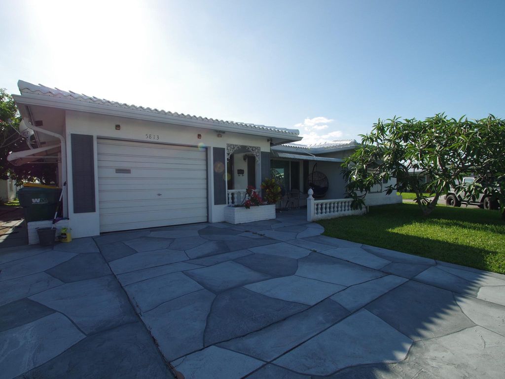 Photo of 5813 NW 82nd Avenue, Tamarac, FL 33321 (MLS # B26026427)