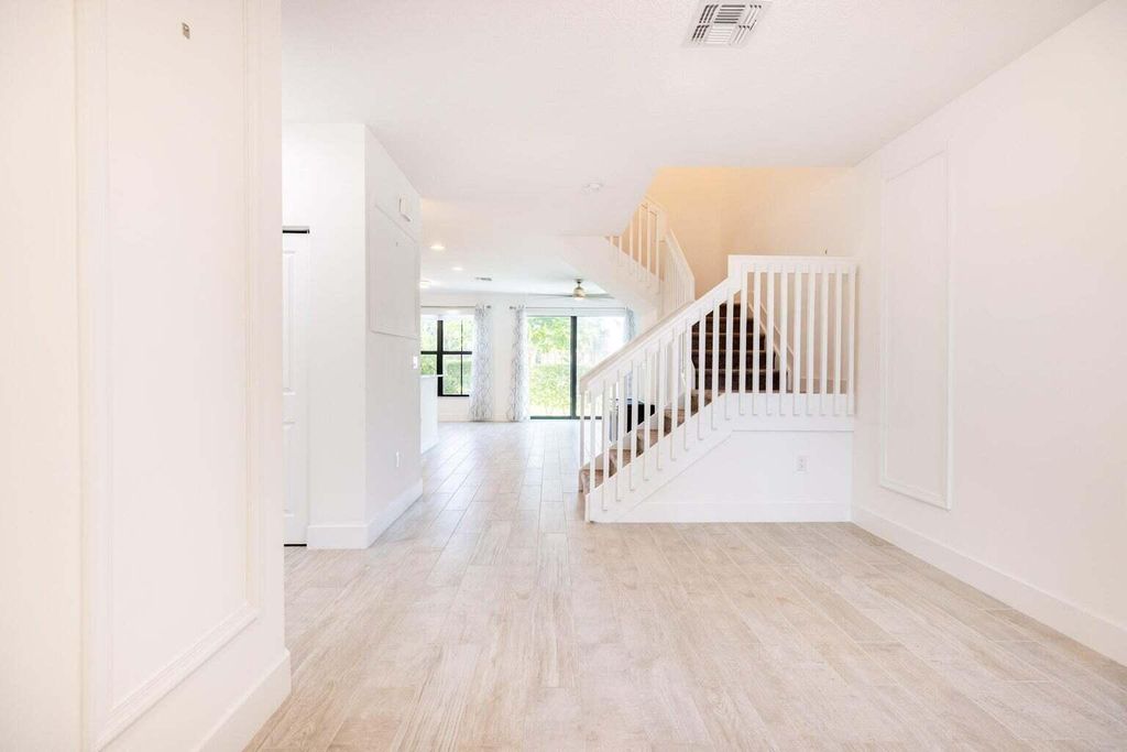 Photo of 2007 Oysterwood Lane, Riviera Beach, FL 33410 (MLS # R10923233)