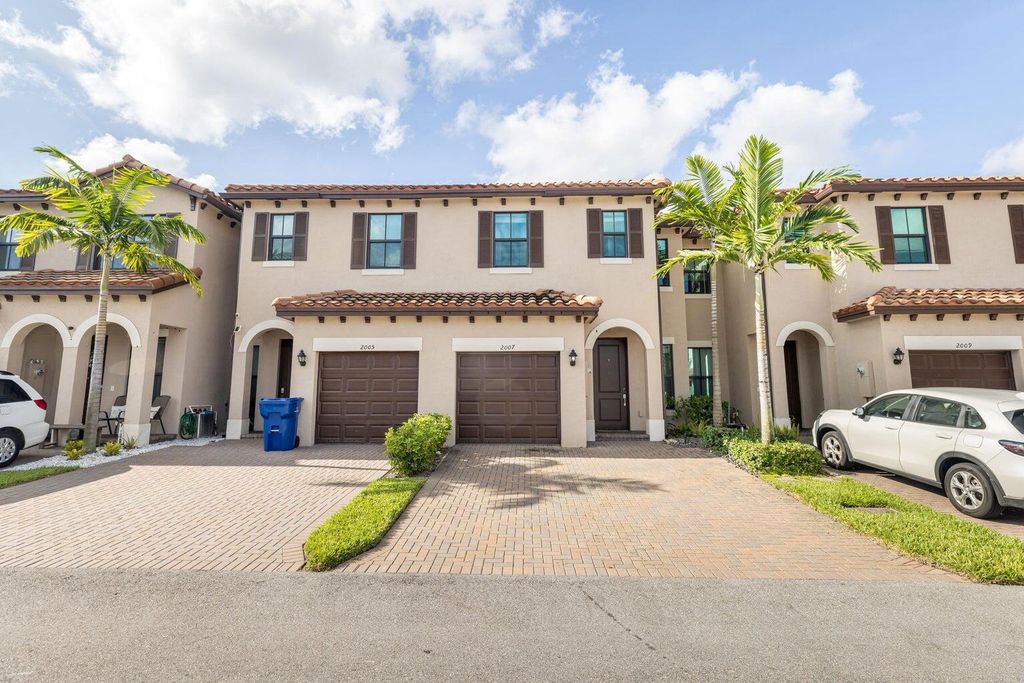 Photo of 2007 Oysterwood Lane, Riviera Beach, FL 33410 (MLS # R10923233)