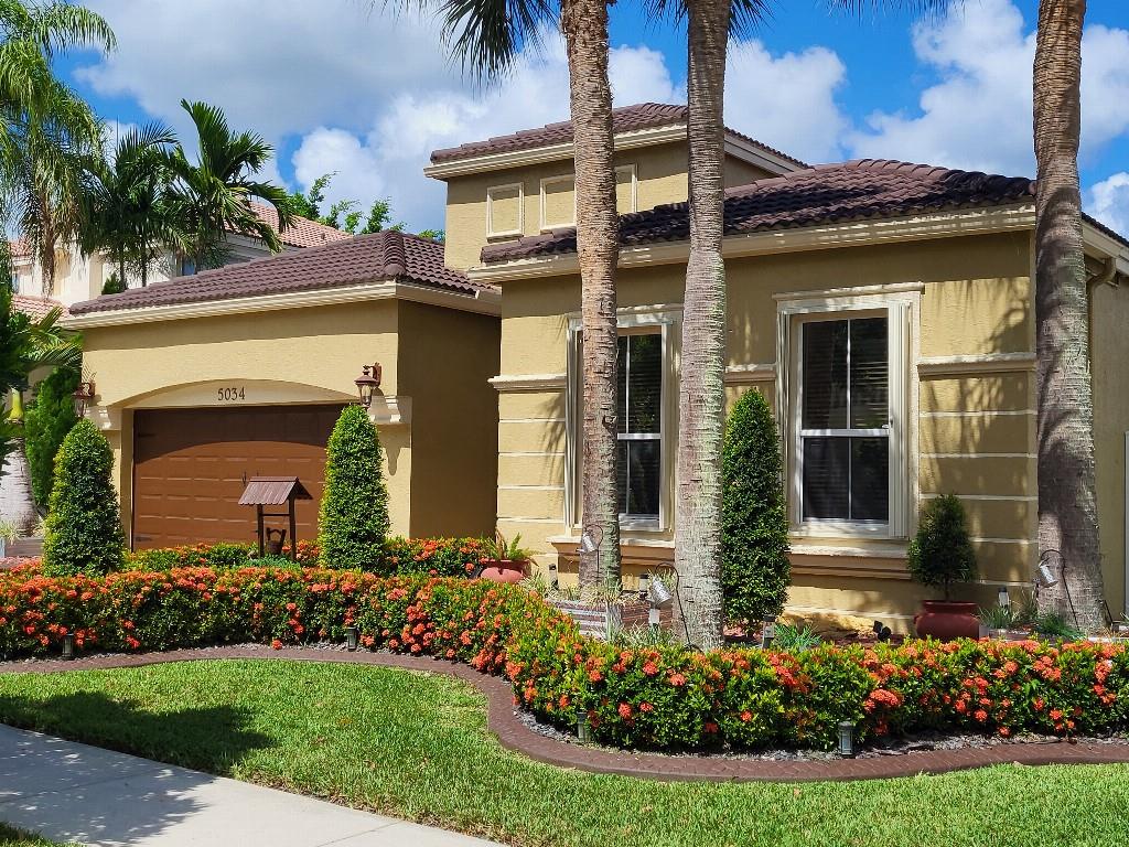 Step into luxury and comfort with this stunning 4 bed, 2. bath home in the beautifully manicured gated community of Riviera Isles offering privacy, space, & resort-style living. Natural light fills every room, highlighting high ceilings and gorgeous wood plank flooring throughout. The kitchen features Granite countertops, & stainless-steel appliances. Enjoy a fully fenced backyard. Community perks include a clubhouse, resort-style pool, tennis, pickleball, & basketball courts, and a professional-grade gym overlooking a 225-acre lake. Close to parks, golf, dining, & entertainment. 2-car garage, laundry room and beautiful curb appeal. A must see!