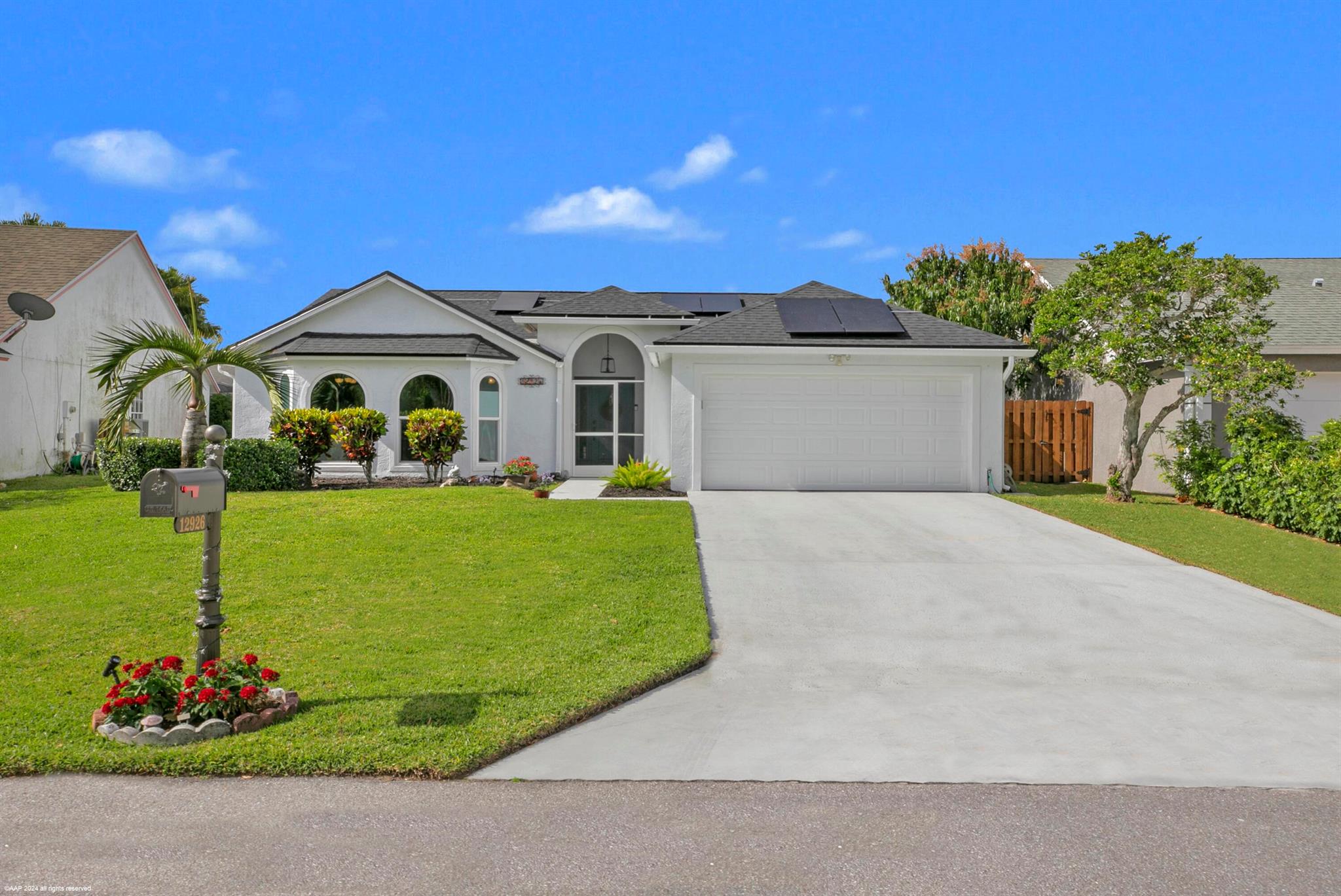 Utilities, cable/wifi included in rent. Welcome to your seasonal sanctuary! This pristine 3-bedroom, 2-bathroom home with attached garage offers the perfect blend of comfort and convenience. Nestled in the gated and secure Meadowland Cove just 3 miles to Wellington International, enjoy access to the beautiful community pool on the lake! Step inside to exactly what you need for season: a clean, open floor plan with private primary wing and separate hallway with guest bedrooms. The fully fenced backyard has a shaded patio for relaxing and unwinding after long horse show days. Third bedroom is currently configured as an office; a bed can be added upon request.