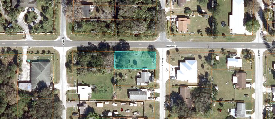 Build your dream home on this high and dry corner lot.  55' x 140.5'.  This property is minutes from downtown, beaches, shopping and the Interstate.  Buyer to verify all zoning, building restrictions, utility access with St Lucie County. Partially cleared.  Nice home across the street. City water has recently been extended into this area. See utility map in photos that shows city water line in front and stubbed to the property. About 50% of this lot has been cleared and is in mowed grass.