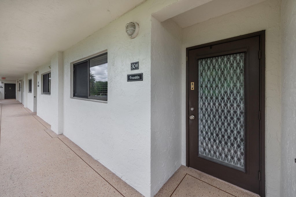 Photo of 15244 Lakes Of Delray Boulevard #304, Delray Beach, FL 33484 (MLS # B26039142)