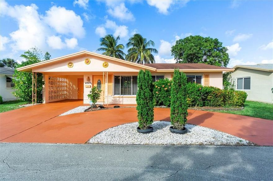 MOVE-IN READY 2 Bedroom 2 Bathroom Single Family home WITH WATER VIEWS!!! Home is in a 55+ age or older community. This home features a HUGE Pantry, Separate Laundry Room, Tile Flooring throughout, and Spacious Kitchen with solid wood kitchen cabinets.  You’ll love the Huge Screened in Patio that looks out to the lush landscaping complete with fruit trees and water views.  Not to mention the Circular driveway with carport.  The community boasts quiet streets, clubhouse, & two newly renovated pools. Close to Turnpike, Convenient shopping all around, about 10 miles to "Lauderdale by the Sea" beach. Minimum 685 credit score.