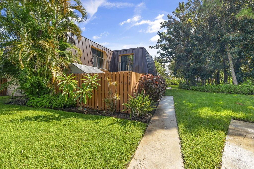 Photo of 5764 SE Windsong Lane, Stuart, FL 34997 (MLS # R10913720)