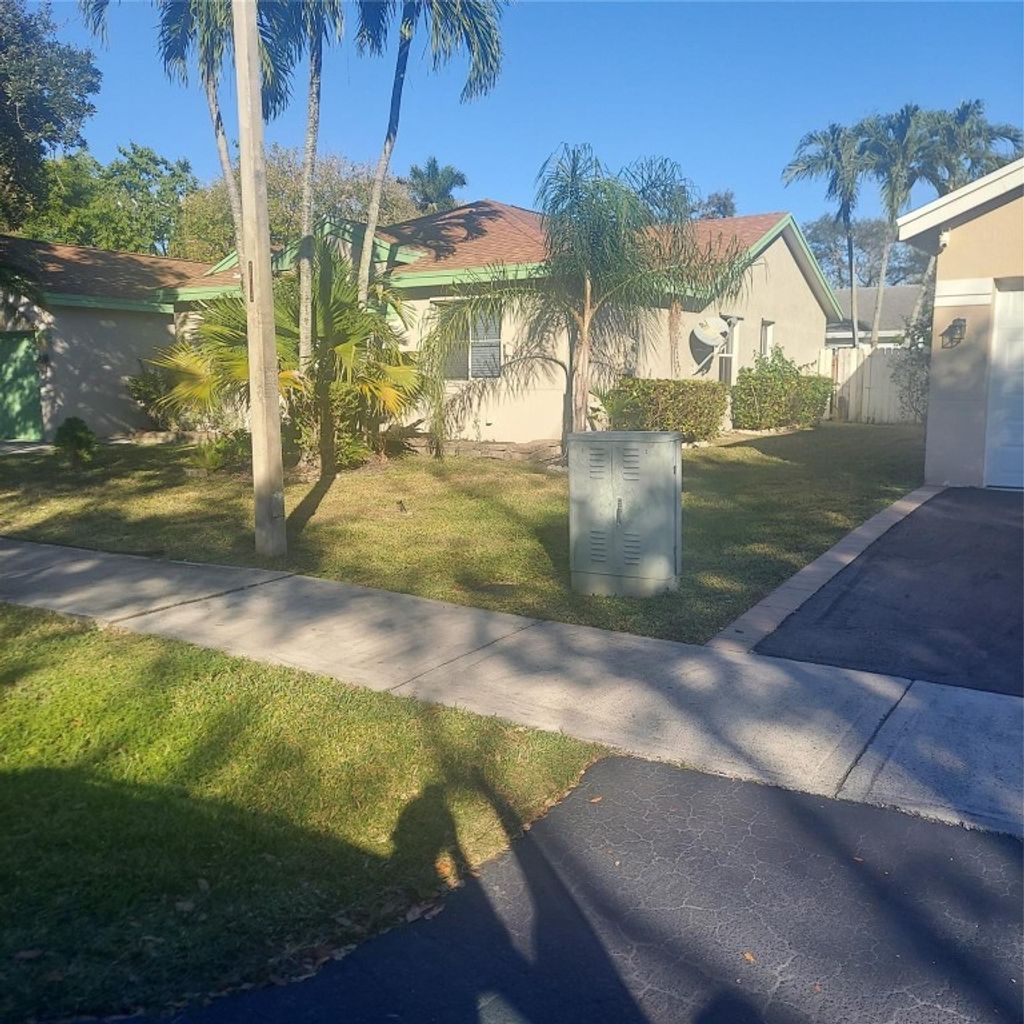 Photo of 1424 NW 49th Avenue, Coconut Creek, FL 33063 (MLS # F10538117)