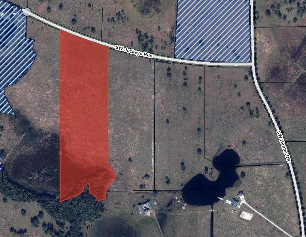 Photo of 26054 SW Jockeys Run, FL 34974 (MLS # R10752077)