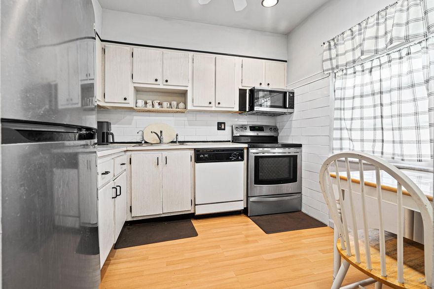 Cozy and well-kept, partially furnished 2/2 corner condo on 2nd floor. Serene garden view from the screened-in balcony. Laminate & tile floors throughout, Great floor plan. Well managed 55+ community w/ affordable maintenance fees that include water, sewer, trash, basic cable. The community has 2 pools w/ lounge chairs, large clubhouse, fitness center, card room, library, shuffle & billiards room, on-site management & plenty of guest parking. Common laundry facilities located on each floor. Publix directly across the street & malls nearby.