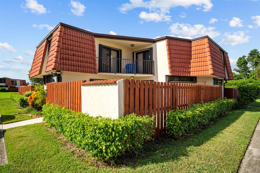 Beautiful and well taken care of 2/2.5 townhouse in centrally located neighborhood of Somerset! This home features a spacious living room, gorgeous Spanish Style tile all throughout the house, and all impact resistant windows PLUS all accordion shutters! Outdoor space is spacious and well kept, perfect for entertaining. Two parking spaces right in front for your convenience. This neighborhood is close to highways and shopping. It Features a community pool, Tennis courts and its close to downtown West Palm beach, Dining, Zoo, beaches and the Palm Beach International Airport. LOW HOA! Schedule a showing today!