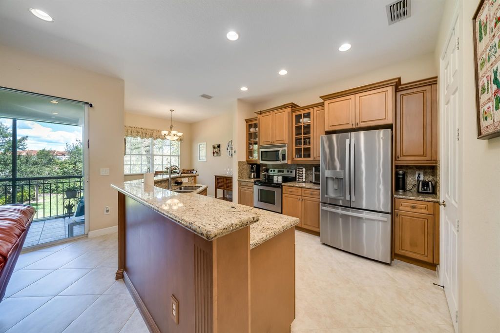 Photo of 8348 NW 127th Lane #26-E, Parkland, FL 33076 (MLS # R11137157)