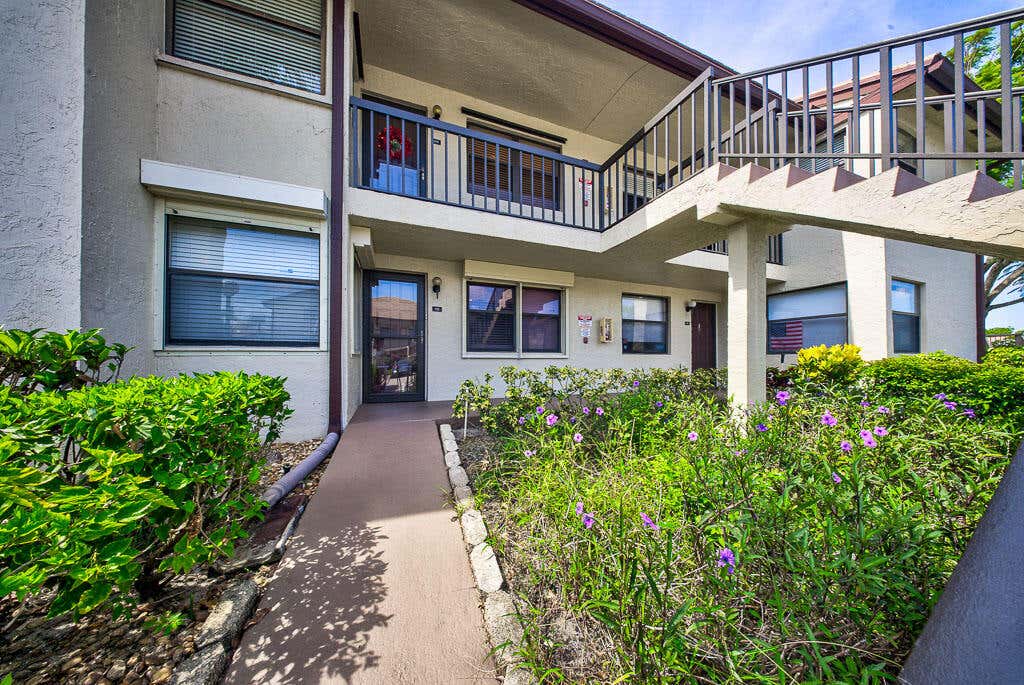 Photo of 7650 Tahiti Lane #105, Lake Worth, FL 33467 (MLS # B26059147)