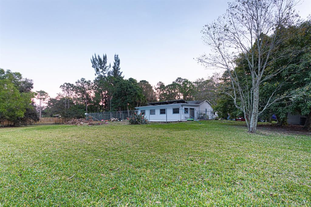 Photo of 13573 59th Court N, West Palm Beach, FL 33411 (MLS # R10861561)