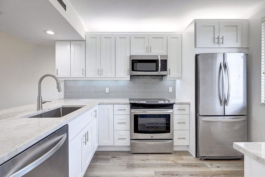 Photo of 2001 Marina Isle Way #403, Jupiter, FL 33477 (MLS # R10776712)