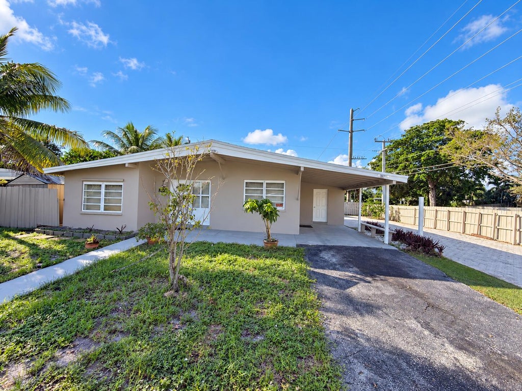 Photo of 1500 NE 42ND Court, Pompano Beach, FL 33064 (MLS # B26084786)