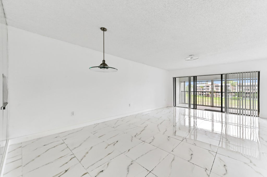 Photo of 4793 Esedra Court #307, Lake Worth, FL 33467 (MLS # B26086397)