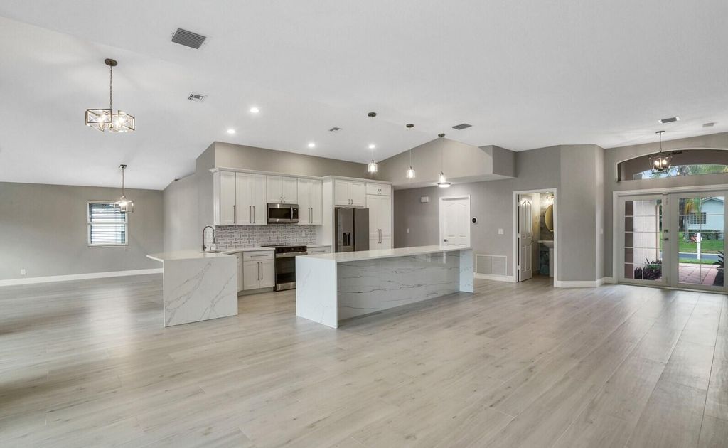 Photo of 2559 Egret Lake Drive, Greenacres, FL 33413 (MLS # R11067062)