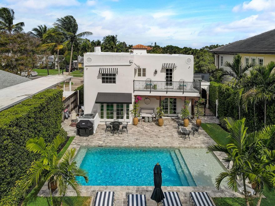 Recently featured in both Coastal Living and House Beautiful, this Spanish Mediterranean gem, built in 1931, was gutted in 2021 and painstakingly updated with every modern convenience (including new roof, new plumbing, new wiring, whole house water filtration system) while preserving its historical gravitas and architectural charm. (The fireplace and its tilework, cathedral windows in the Florida room, and stair railing are all original to the house.) Chic encaustic tiles throughout instill a  distinctive island palette that marries casual elegance with a refined aesthetic. The chef's kitchen boasts a Sub-zero fridge, Ilvy gas range, Bosche washer/dryer and custom lacquered cabinetry. The primary bedroom has an attached dressing room that can double as an office or 4th bedroom/nursery.